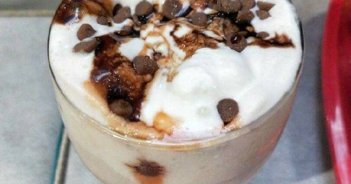 Hot chocolate milk with vanilla Ice-Cream and choco-chips on top Recipe by Chef Monika Manji Patel - Cookpad